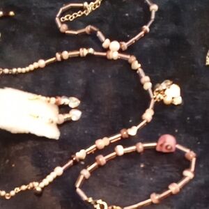 Elegant Purple And White Charm Bracelet with Multi-Strand Design